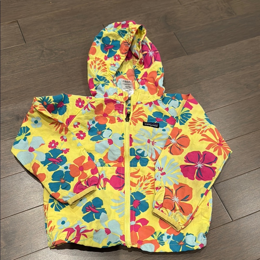 Patagonia Yellow Raincoat with Floral Print and Hood